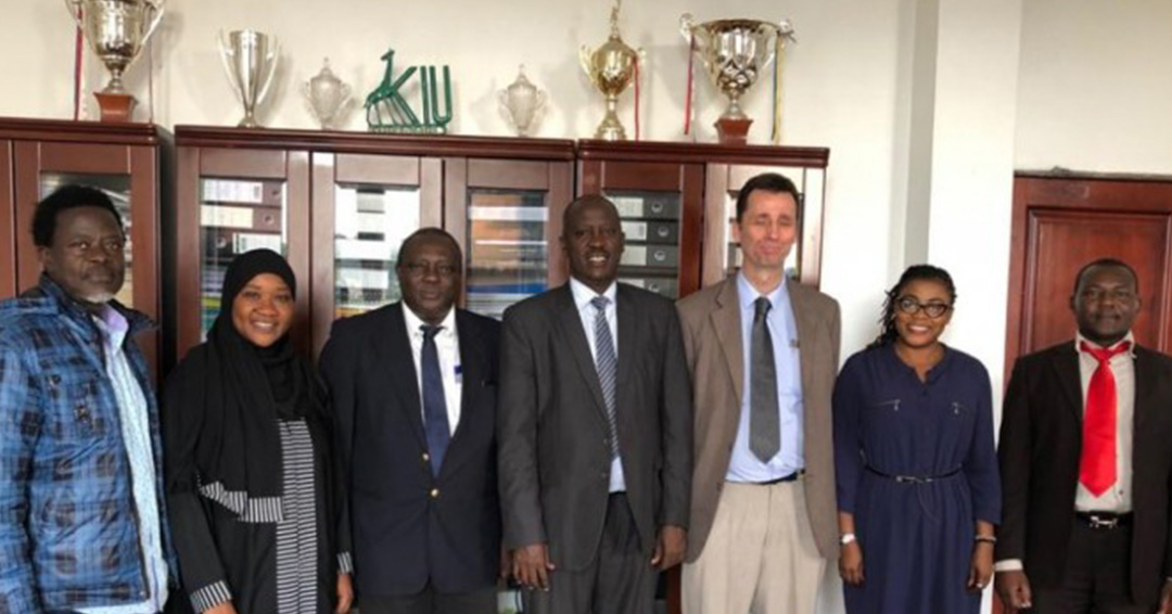 Dr. Peter Samuels Pays Courtesy Call on KIU Management